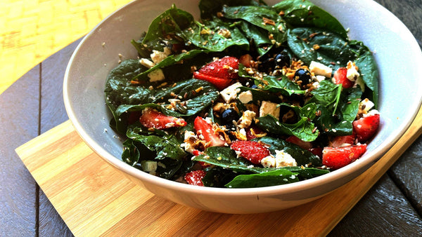 Berries and baby spinach salad
